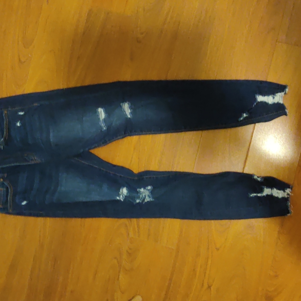 I'm selling a pair of ripped jeans